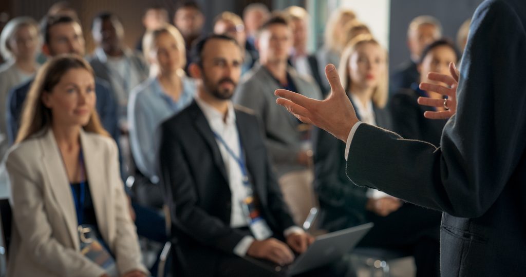 Get on the Agenda: Why a Speaking Slot Beats a Booth at K-12 Conferences